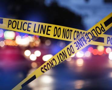 police tape over a crime scene