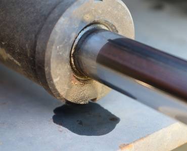 A piece of machinery leaking hydraulic fluid