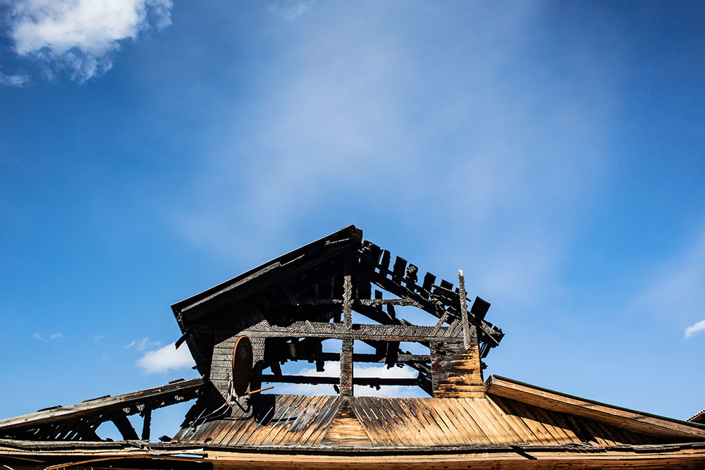 The burnt roof of a house