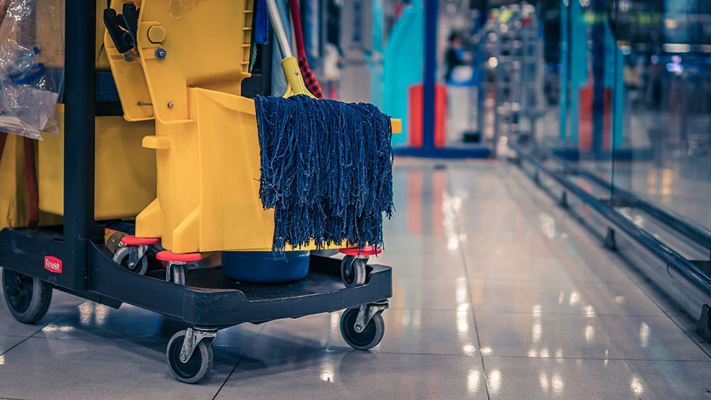 A cropped image of a cleaning trolley in a warehouse