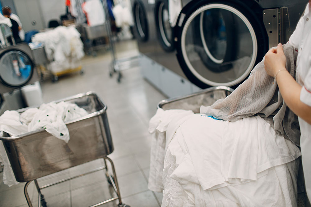 Clothes being prepared for dry cleaning