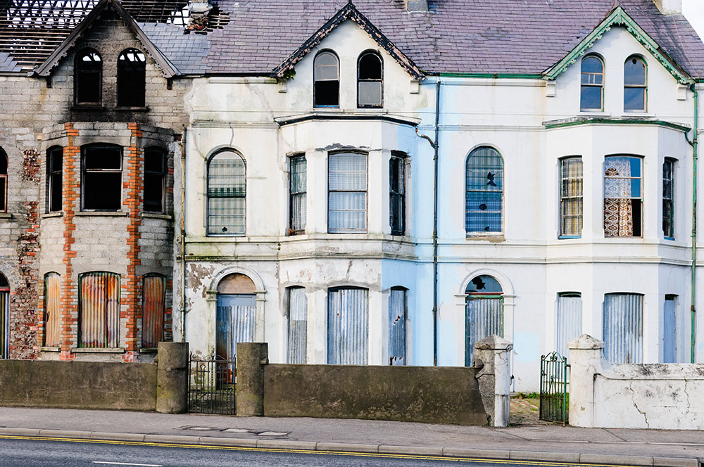 Burnt and derelict houses