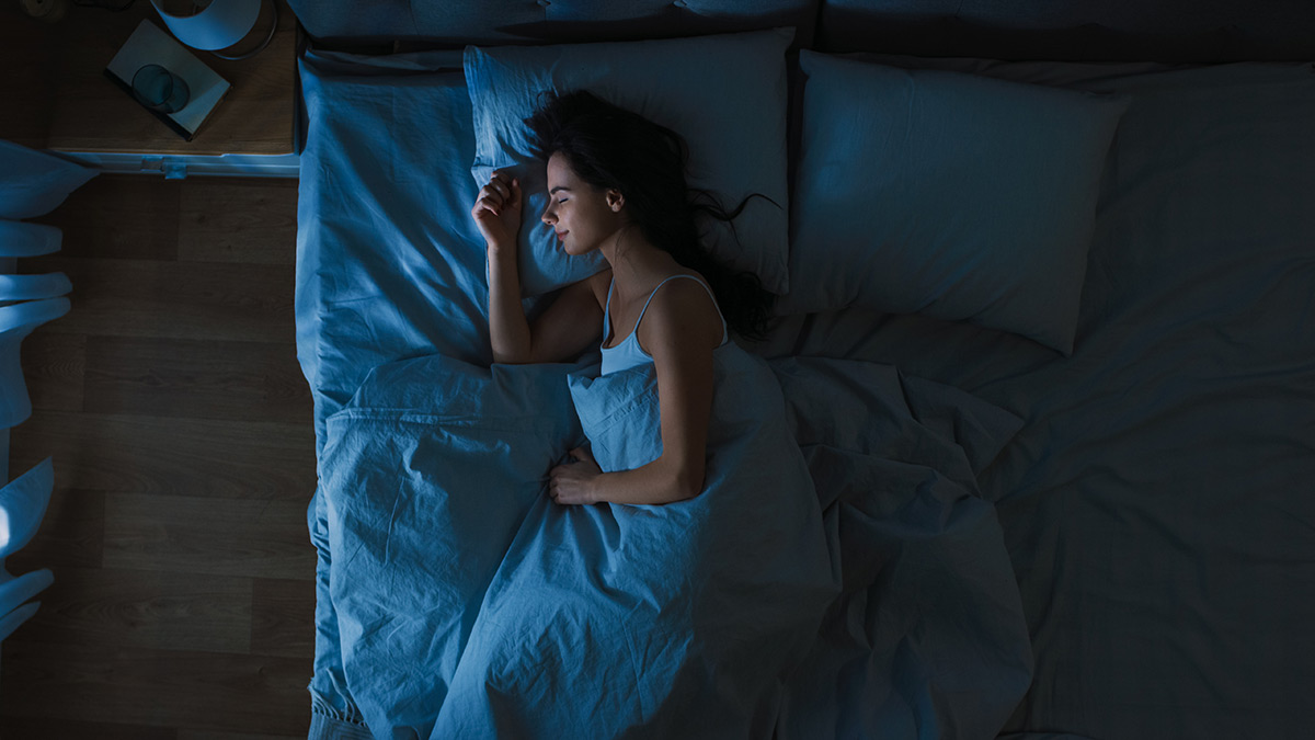 Woman asleep in bed