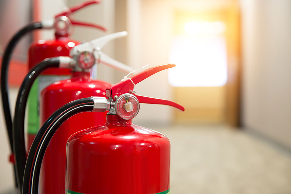 A row of fire extinguishers