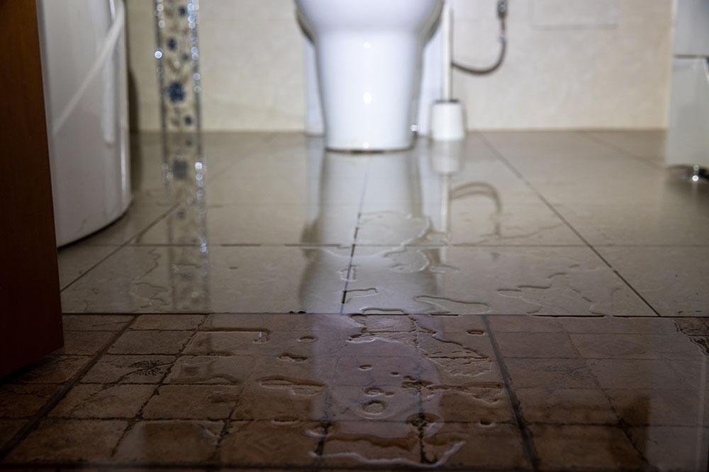 Flooded bathroom floor