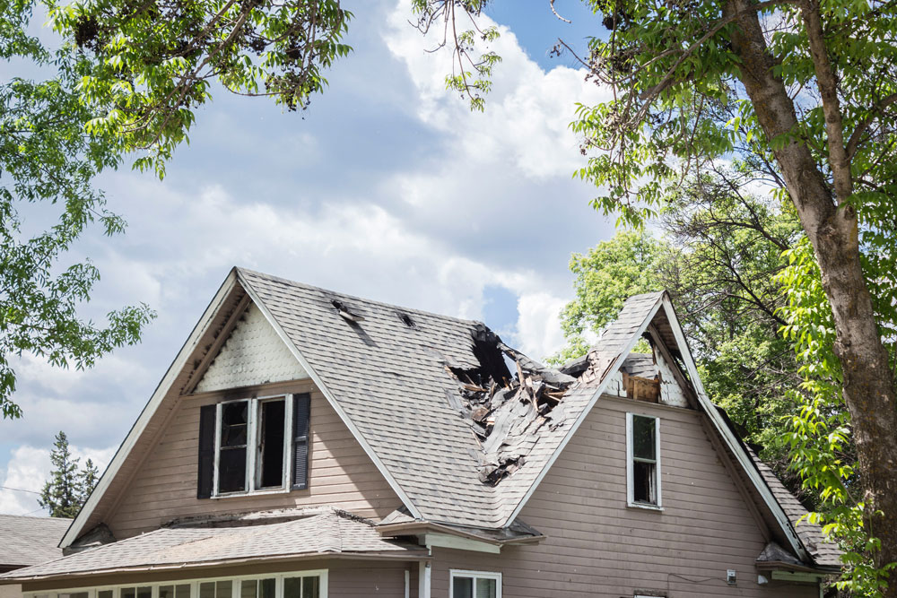 House with fire damaged roof