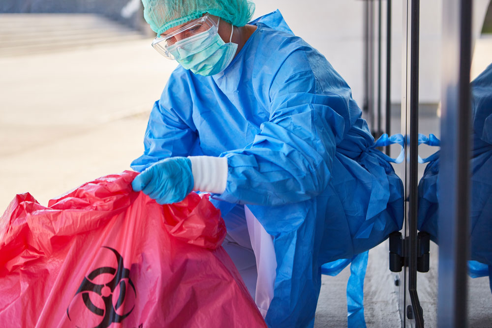 Specialist cleaner cleaning up biohazards