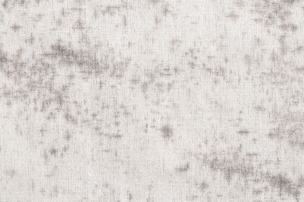 Grey mould stains on white fabric