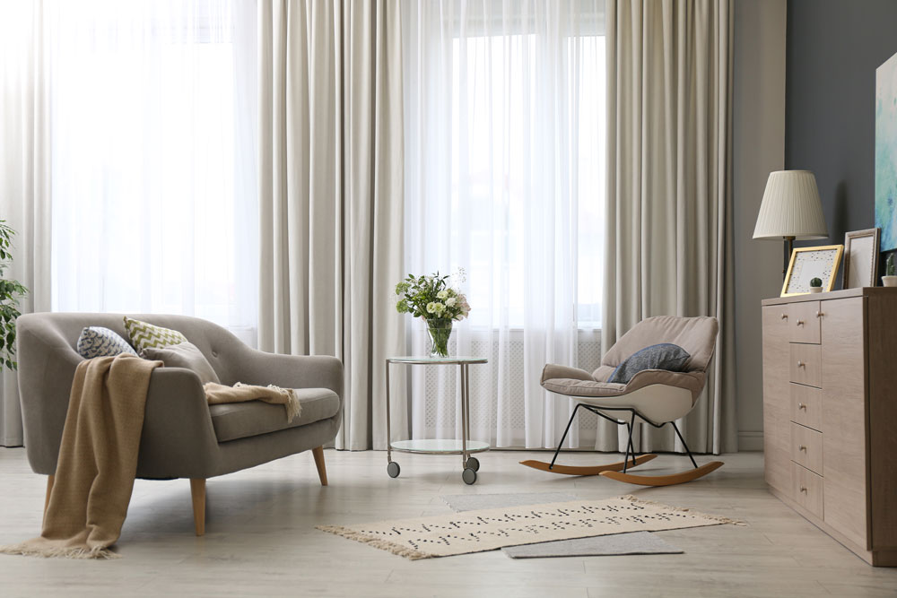 A living room with curtains