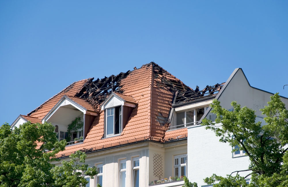 House with a fire damaged roof