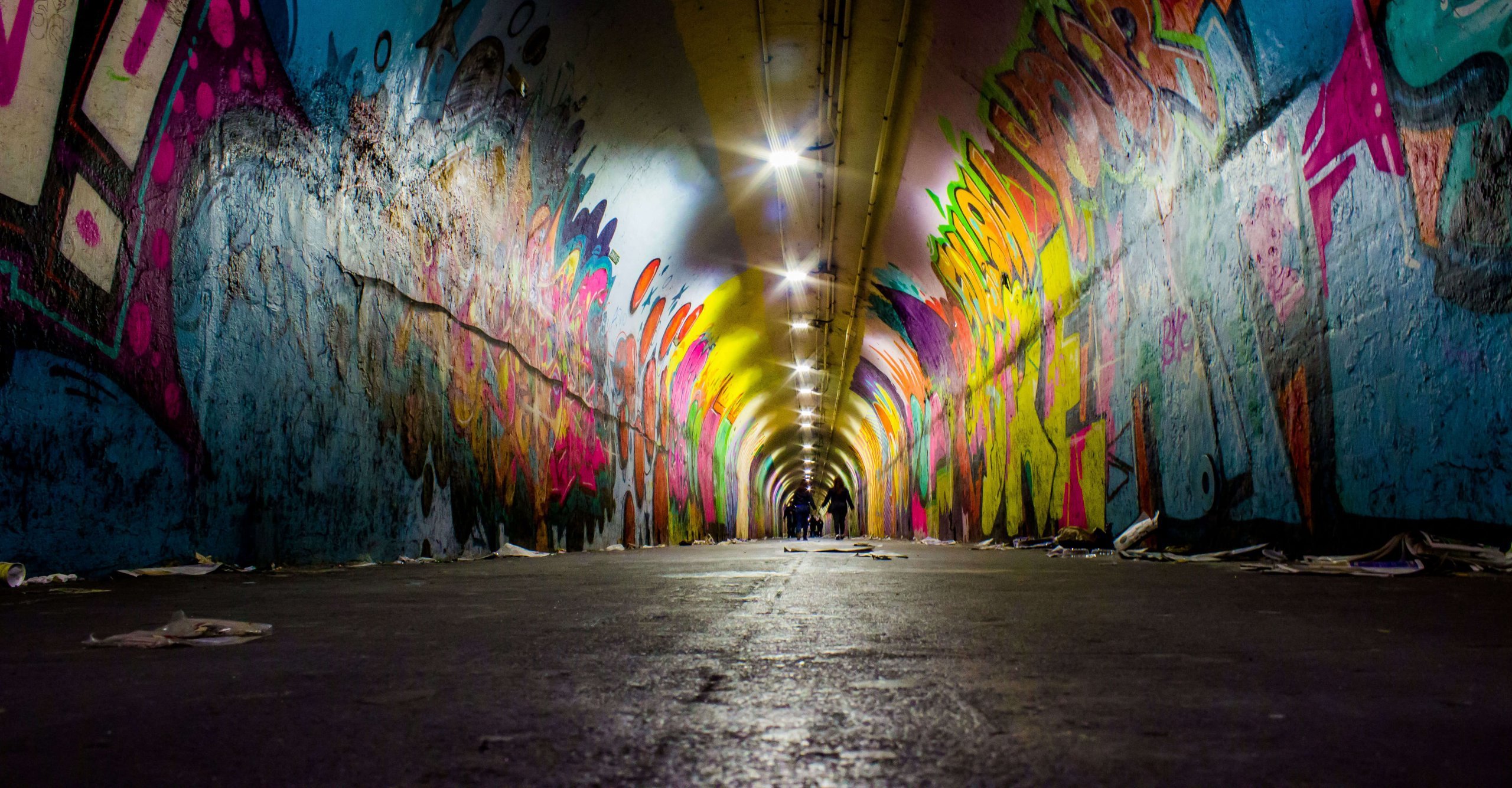 Graffiti covering the walls of a tunnel