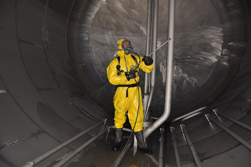 Technician inside a tank