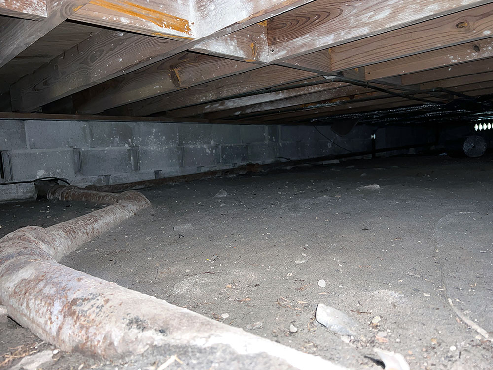 A crawl space underneath a house