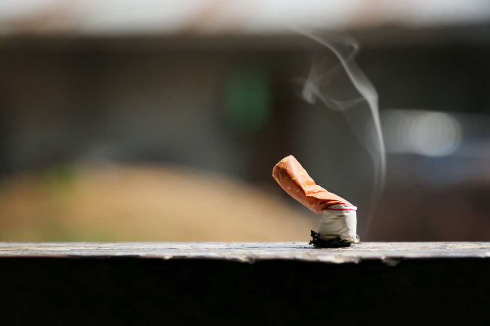 cigarette stubbed out on wall