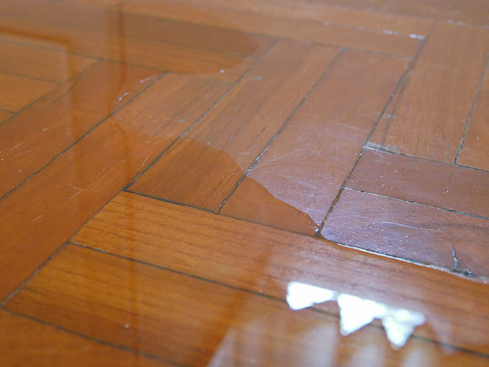 Water on wooden floor
