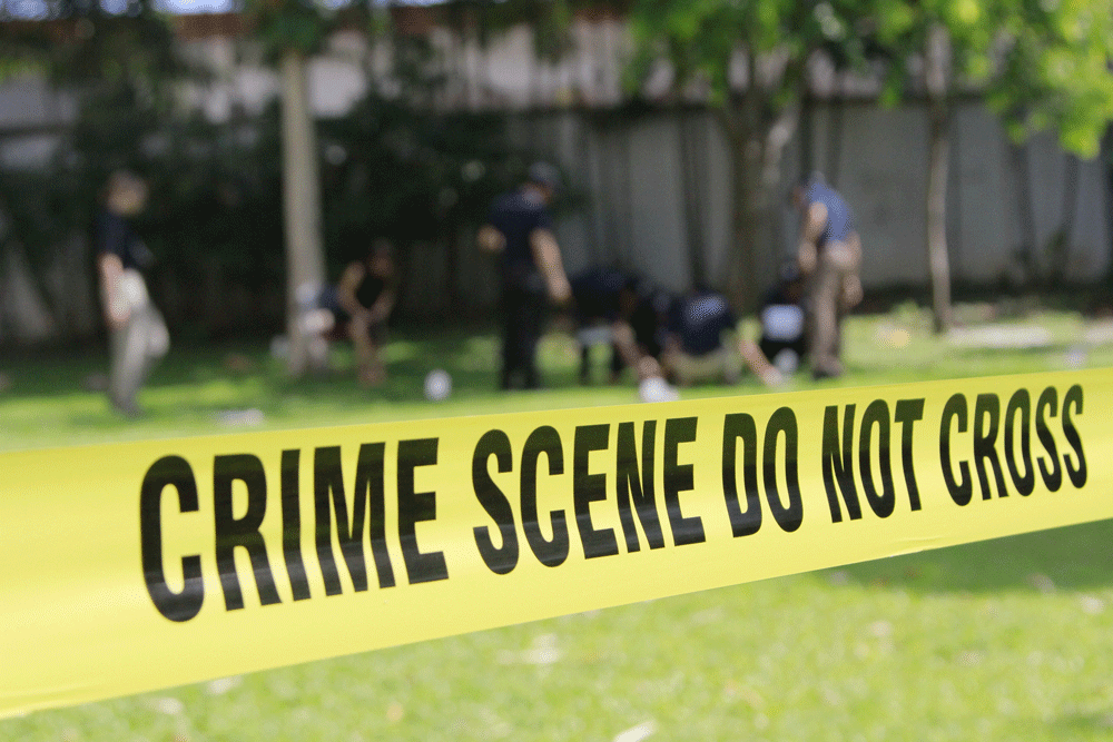 Crime scene tape in front of a crime scene