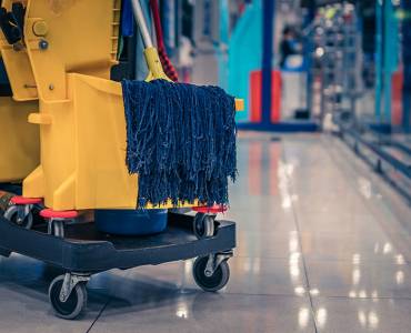 A cropped image of a cleaning trolley in a warehouse